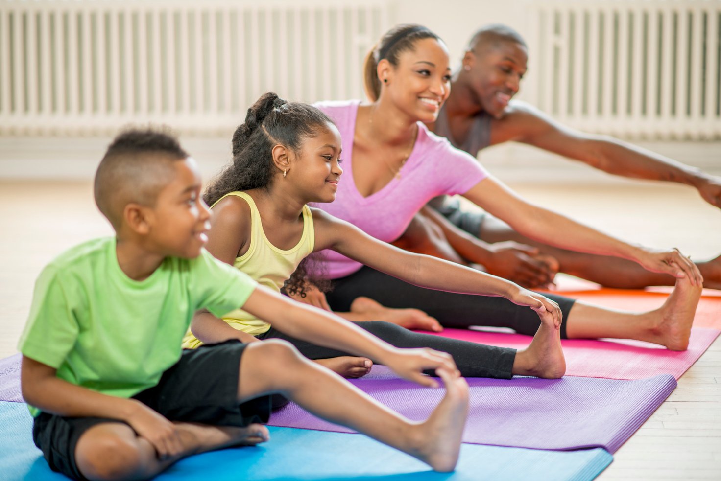 Family Taking a Yoga Class